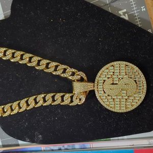 Iced out money sign and chain